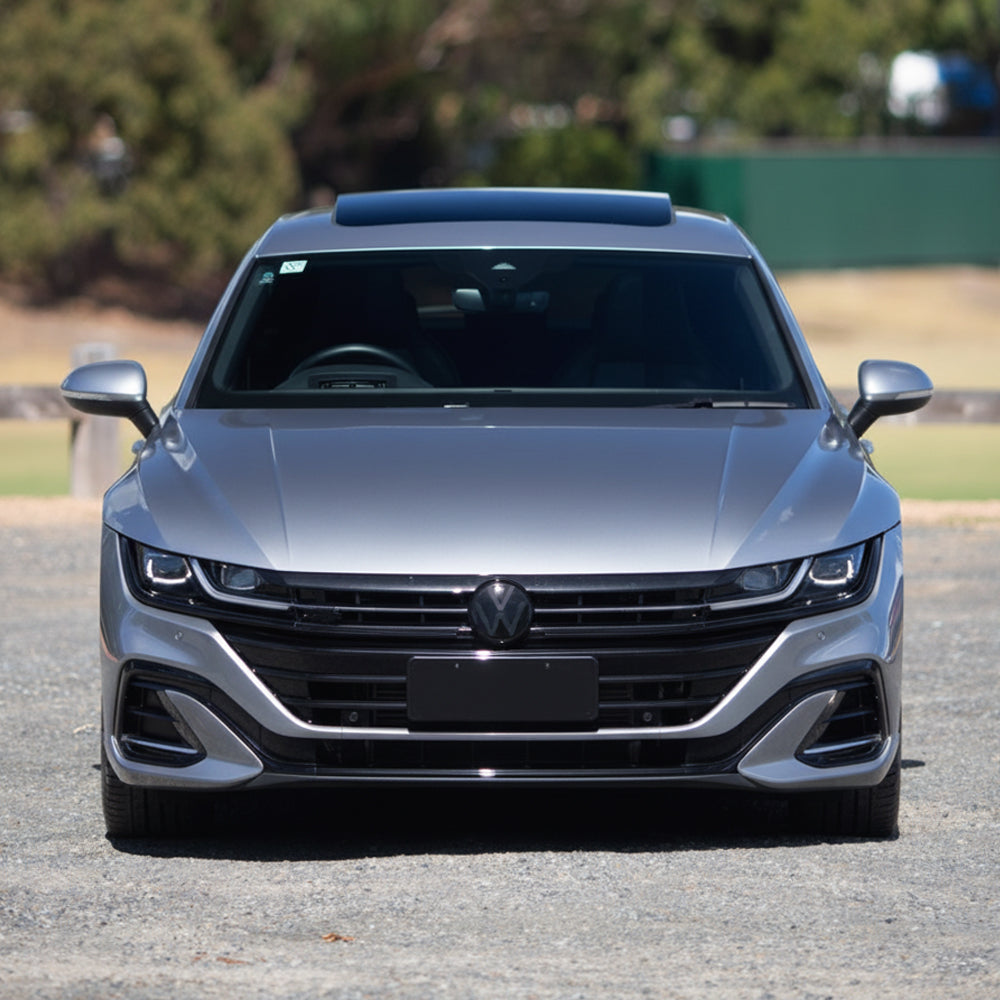Two black VW emblems