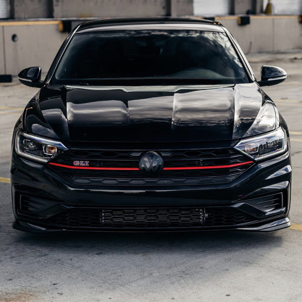 Two black VW emblems