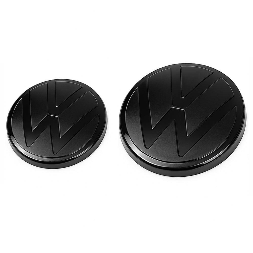 Two black VW emblems