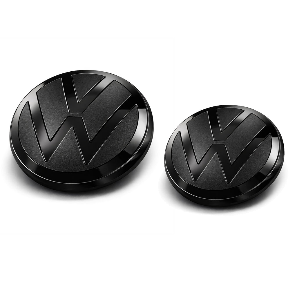 Two black VW emblems